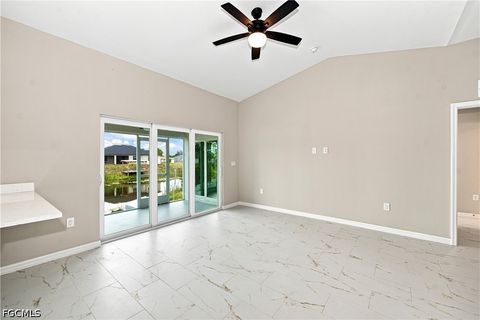 Tiny photo for 1718 NE 13th Place, Cape Coral, FL 33909 (MLS # 2026030297)