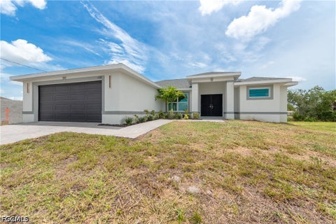 Tiny photo for 1718 NE 13th Place, Cape Coral, FL 33909 (MLS # 2026030297)
