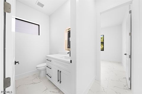 Tiny photo for 2604 27th Street W, Lehigh Acres, FL 33971 (MLS # 2026030891)