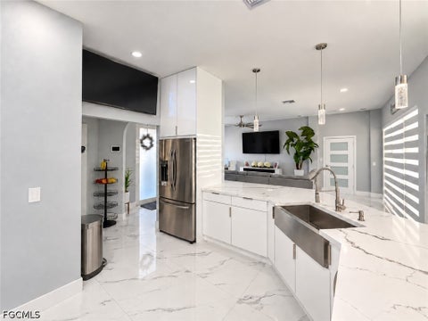 Tiny photo for 452 SW 19th Avenue, Cape Coral, FL 33991 (MLS # 2026037251)