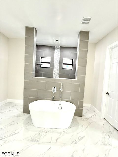 Tiny photo for 2006 NW 21st Street, Cape Coral, FL 33993 (MLS # 2026019563)