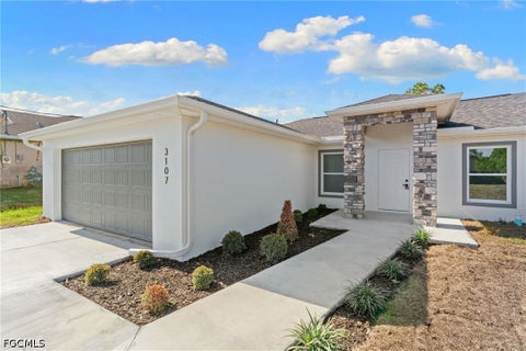 Photo of 519 Hawthorne Avenue S, Lehigh Acres, FL 33974 (MLS # 2026037480)