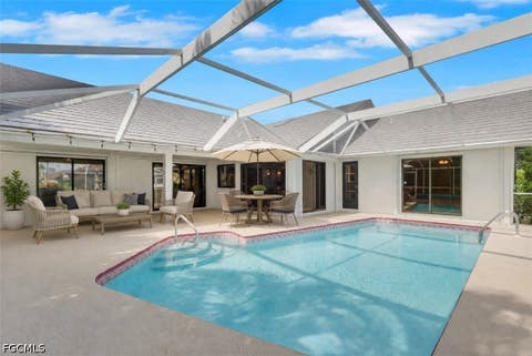 Tiny photo for 1513 SW 57th Street, Cape Coral, FL 33914 (MLS # 2026033187)