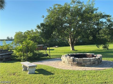 Tiny photo for 2205 Channel Way, North Fort Myers, FL 33917 (MLS # 2026020151)