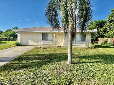 Photo of 516 Parkside Street, Lehigh Acres, FL 33936 (MLS # 2026031036)