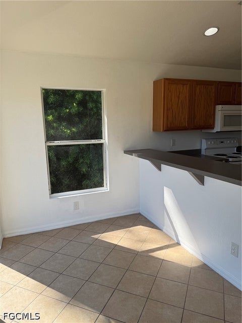 Tiny photo for 335 Reeves Street, Lehigh Acres, FL 33972 (MLS # 2026043118)