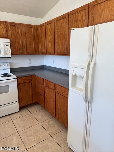 Tiny photo for 335 Reeves Street, Lehigh Acres, FL 33972 (MLS # 2026043118)
