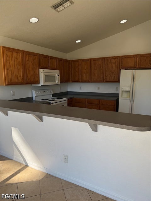 Tiny photo for 335 Reeves Street, Lehigh Acres, FL 33972 (MLS # 2026043118)