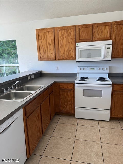 Tiny photo for 335 Reeves Street, Lehigh Acres, FL 33972 (MLS # 2026043118)