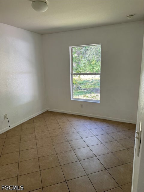 Tiny photo for 335 Reeves Street, Lehigh Acres, FL 33972 (MLS # 2026043118)