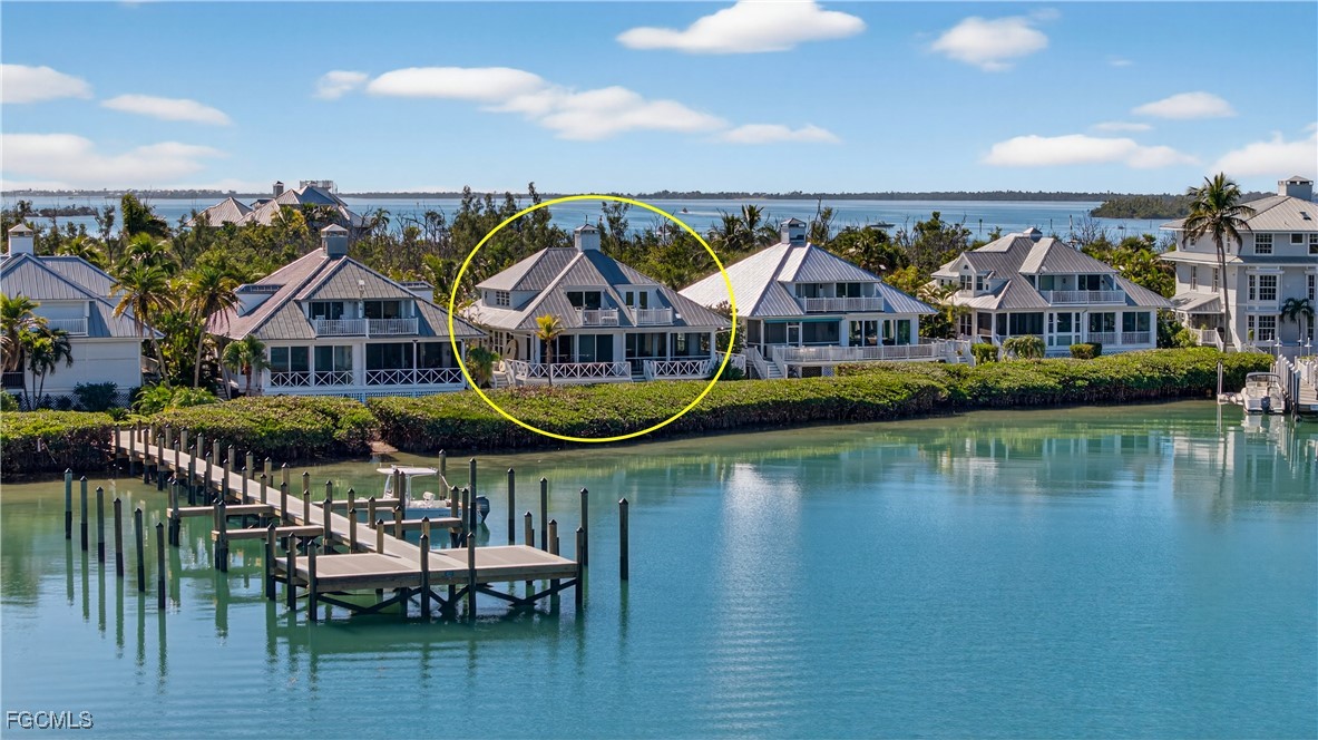 Water view with a dock