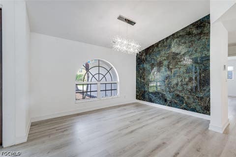 Tiny photo for 1438 SW 57th Street, Cape Coral, FL 33914 (MLS # 2026026767)