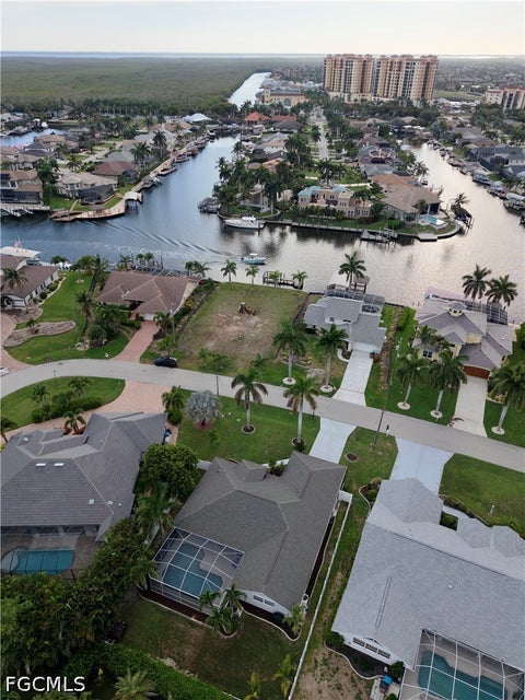 Tiny photo for 1438 SW 57th Street, Cape Coral, FL 33914 (MLS # 2026026767)