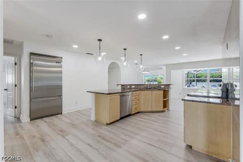 Tiny photo for 1438 SW 57th Street, Cape Coral, FL 33914 (MLS # 2026026767)