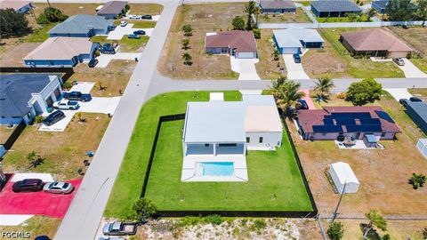 Tiny photo for 818 NE 10th Street, Cape Coral, FL 33909 (MLS # 2026020404)