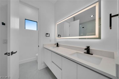 Tiny photo for 818 NE 10th Street, Cape Coral, FL 33909 (MLS # 2026020404)