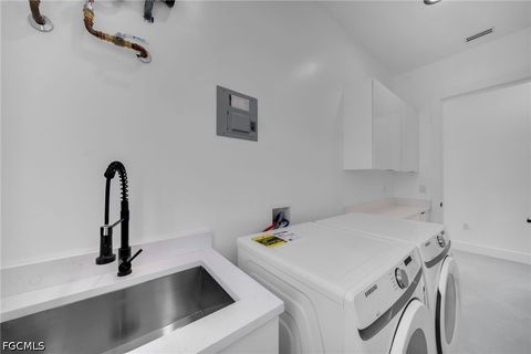 Tiny photo for 818 NE 10th Street, Cape Coral, FL 33909 (MLS # 2026020404)