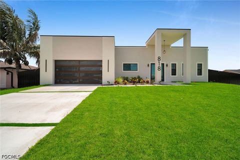 Photo of 818 NE 10th Street, Cape Coral, FL 33909 (MLS # 2026020404)
