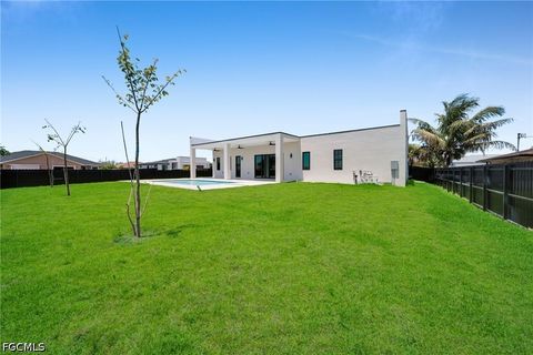 Tiny photo for 818 NE 10th Street, Cape Coral, FL 33909 (MLS # 2026020404)