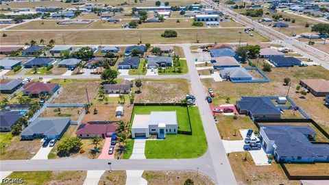 Tiny photo for 818 NE 10th Street, Cape Coral, FL 33909 (MLS # 2026020404)