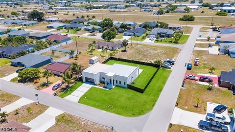 Tiny photo for 818 NE 10th Street, Cape Coral, FL 33909 (MLS # 2026020404)