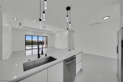 Tiny photo for 818 NE 10th Street, Cape Coral, FL 33909 (MLS # 2026020404)