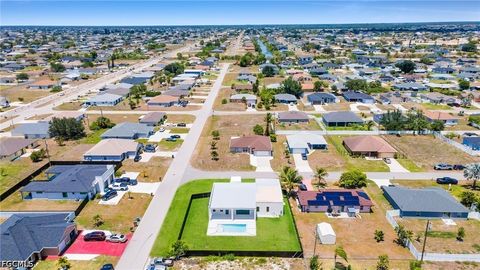 Tiny photo for 818 NE 10th Street, Cape Coral, FL 33909 (MLS # 2026020404)