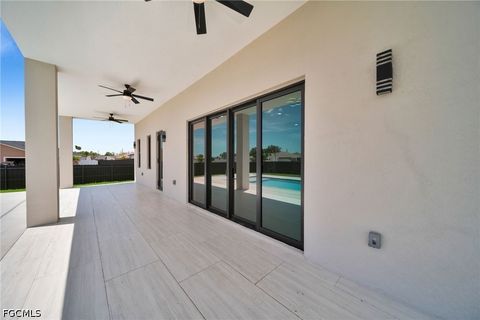 Tiny photo for 818 NE 10th Street, Cape Coral, FL 33909 (MLS # 2026020404)
