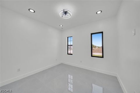 Tiny photo for 818 NE 10th Street, Cape Coral, FL 33909 (MLS # 2026020404)