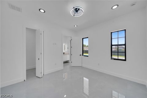 Tiny photo for 818 NE 10th Street, Cape Coral, FL 33909 (MLS # 2026020404)