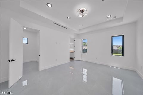 Tiny photo for 818 NE 10th Street, Cape Coral, FL 33909 (MLS # 2026020404)