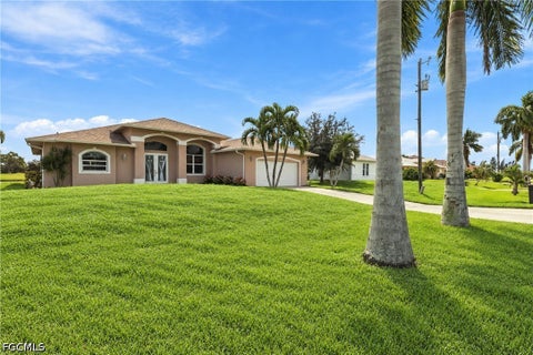 Photo of 1507 NW 29th Place, Cape Coral, FL 33993 (MLS # 2026039121)