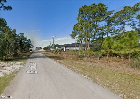 Photo of 925 Bolivia Avenue, Lehigh Acres, FL 33974 (MLS # 2026020304)