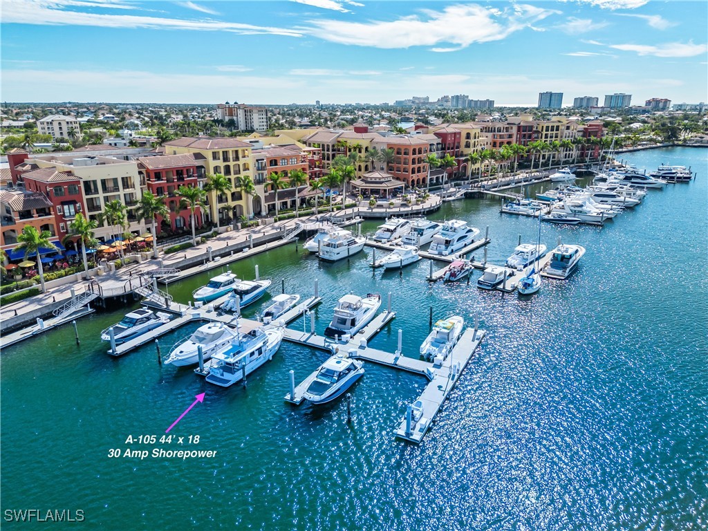 View of urban area with a large body of water and