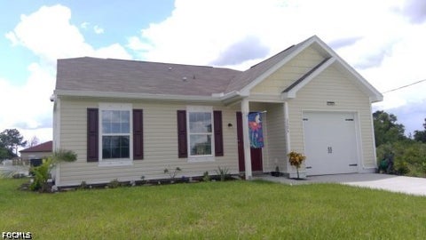 Photo of 3305 25th Street SW, Lehigh Acres, FL 33976 (MLS # 2026043191)