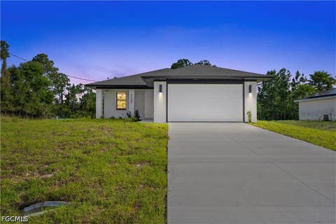 Photo of 2810 73rd Street W, Lehigh Acres, FL 33971 (MLS # 2026034934)
