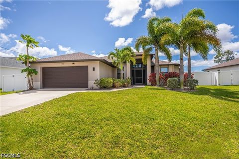 Photo of 910 SW 12th Terrace, Cape Coral, FL 33991 (MLS # 2026015443)