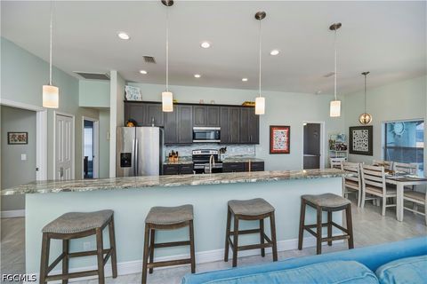 Tiny photo for 910 SW 12th Terrace, Cape Coral, FL 33991 (MLS # 2026015443)