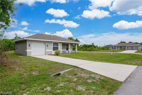 Tiny photo for 546 Sherwood Avenue S, Lehigh Acres, FL 33974 (MLS # 2026032485)