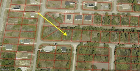 Photo of 617 Trinity Street E, Lehigh Acres, FL 33974 (MLS # 2026031032)