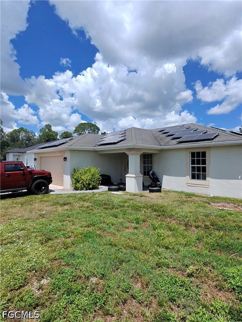 Photo of 2724 6th Street SW, Lehigh Acres, FL 33976 (MLS # 2026038712)