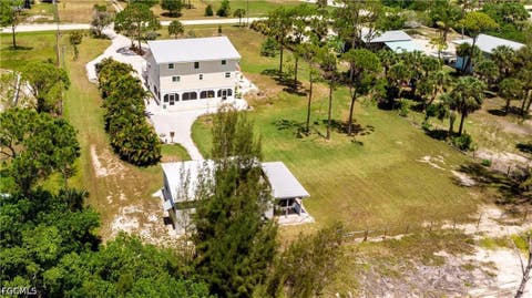 Tiny photo for 8626 Redwood Drive, St James City, FL 33956 (MLS # 2026028120)