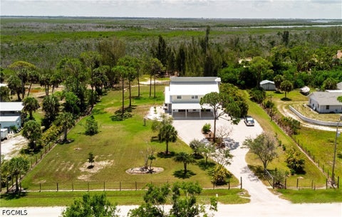 Photo of 8626 Redwood Drive, St James City, FL 33956 (MLS # 2026028120)