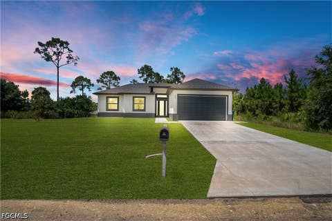 Photo of 505 E 9TH ST ST, Lehigh Acres, FL 33972 (MLS # 2026035698)