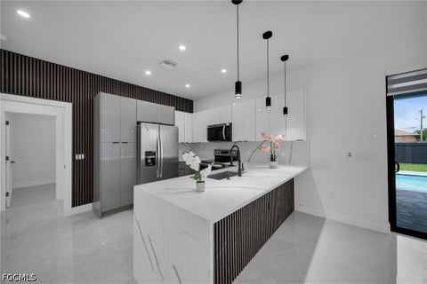 Tiny photo for 1013 NE 12th Terrace, Cape Coral, FL 33909 (MLS # 2026039567)