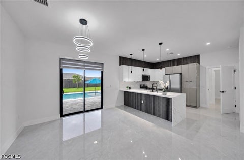 Tiny photo for 1013 NE 12th Terrace, Cape Coral, FL 33909 (MLS # 2026039567)