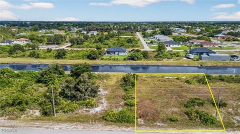 Photo of 349 Paulcrest Avenue, Lehigh Acres, FL 33974 (MLS # 2025017257) Photo of 349 Paulcrest Avenue, Lehigh Acres, FL 33974 (MLS # 2025017257)