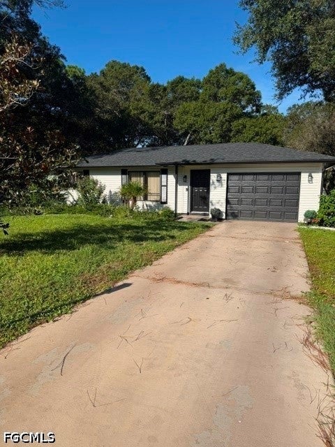 Photo of 19 Hamilton Avenue, Lehigh Acres, FL 33936 (MLS # 2026041938)