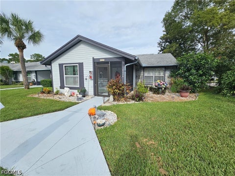 Photo of 10426 Lakeport Court, Lehigh Acres, FL 33936 (MLS # 2026041123)