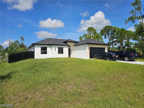 Tiny photo for 1211 McKinley Avenue, Lehigh Acres, FL 33972 (MLS # 2026039387)